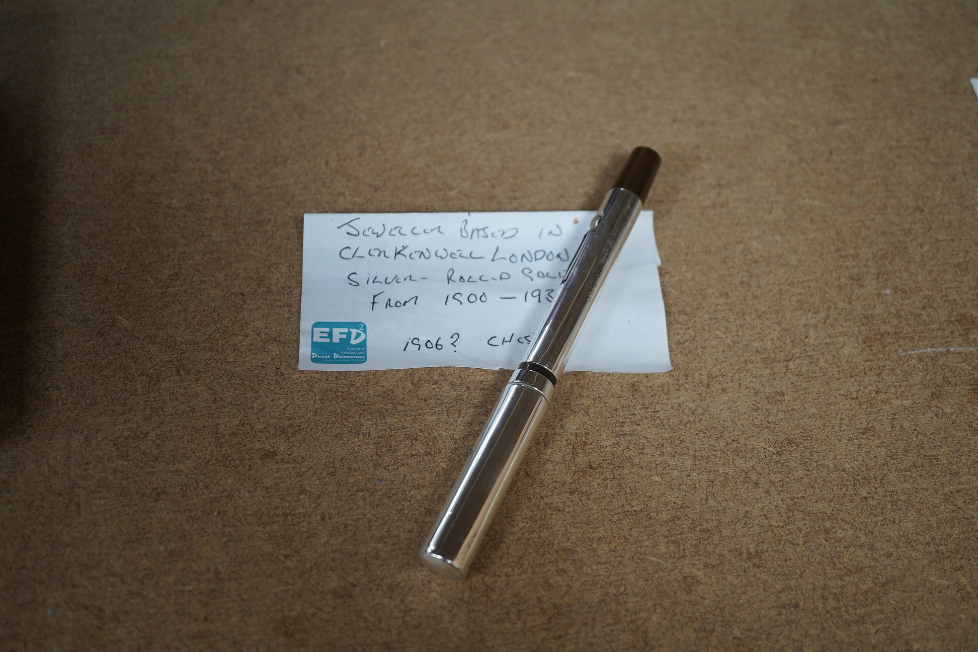 A Battle Axe lever fountain pen in silver, with 14ct gold nib, 14cm in length. Condition - fair